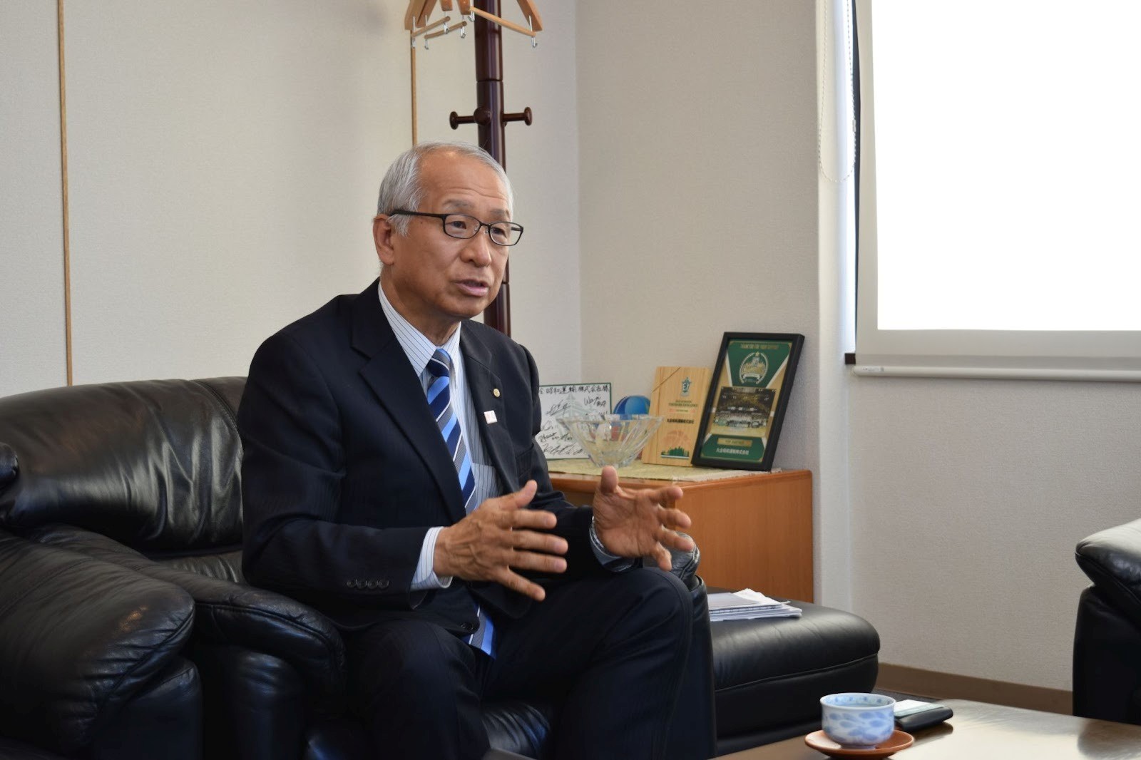 丸全昭和運輸社長、岡田廣次氏