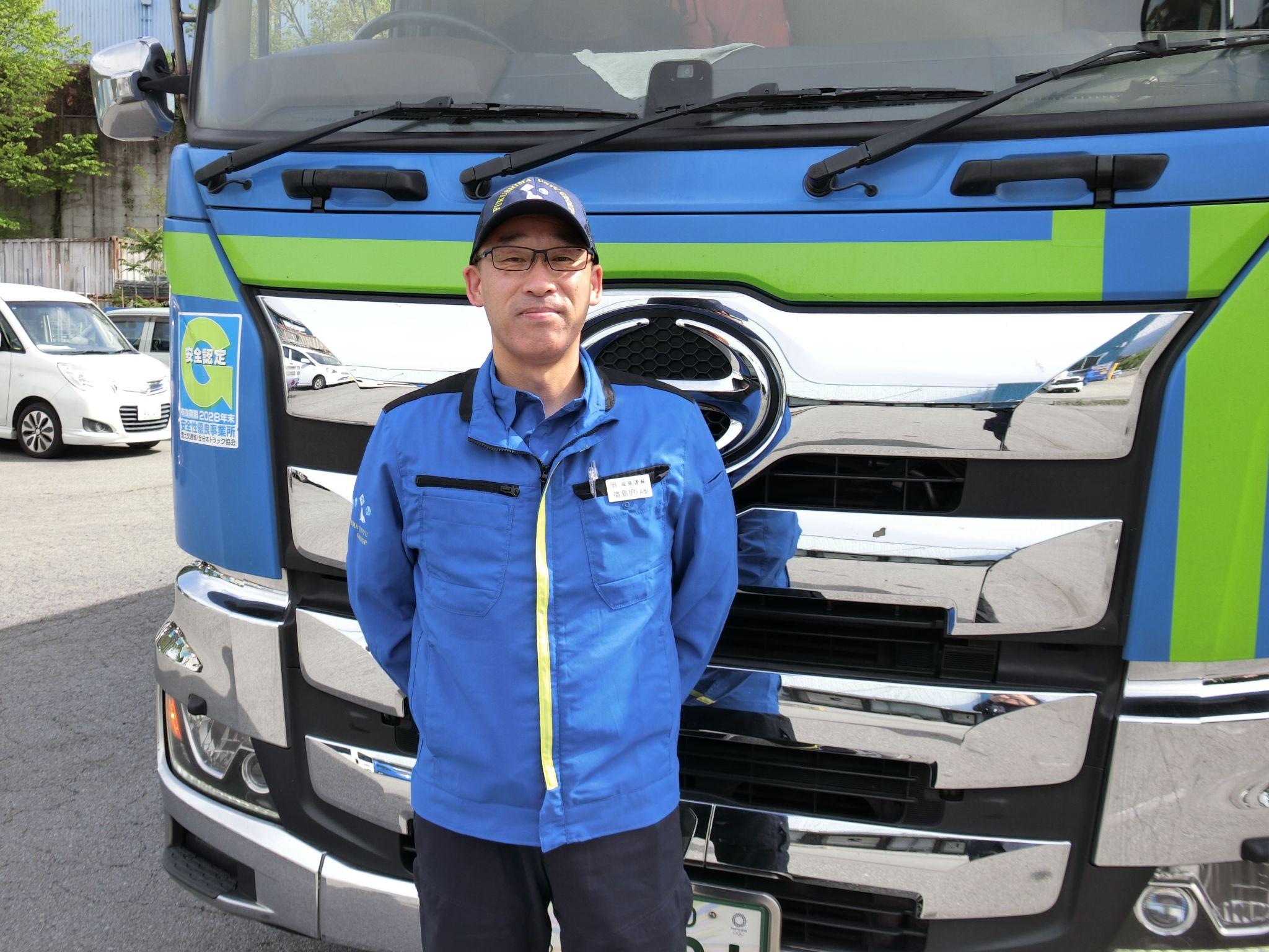 新しいユニホームを着る福島社長